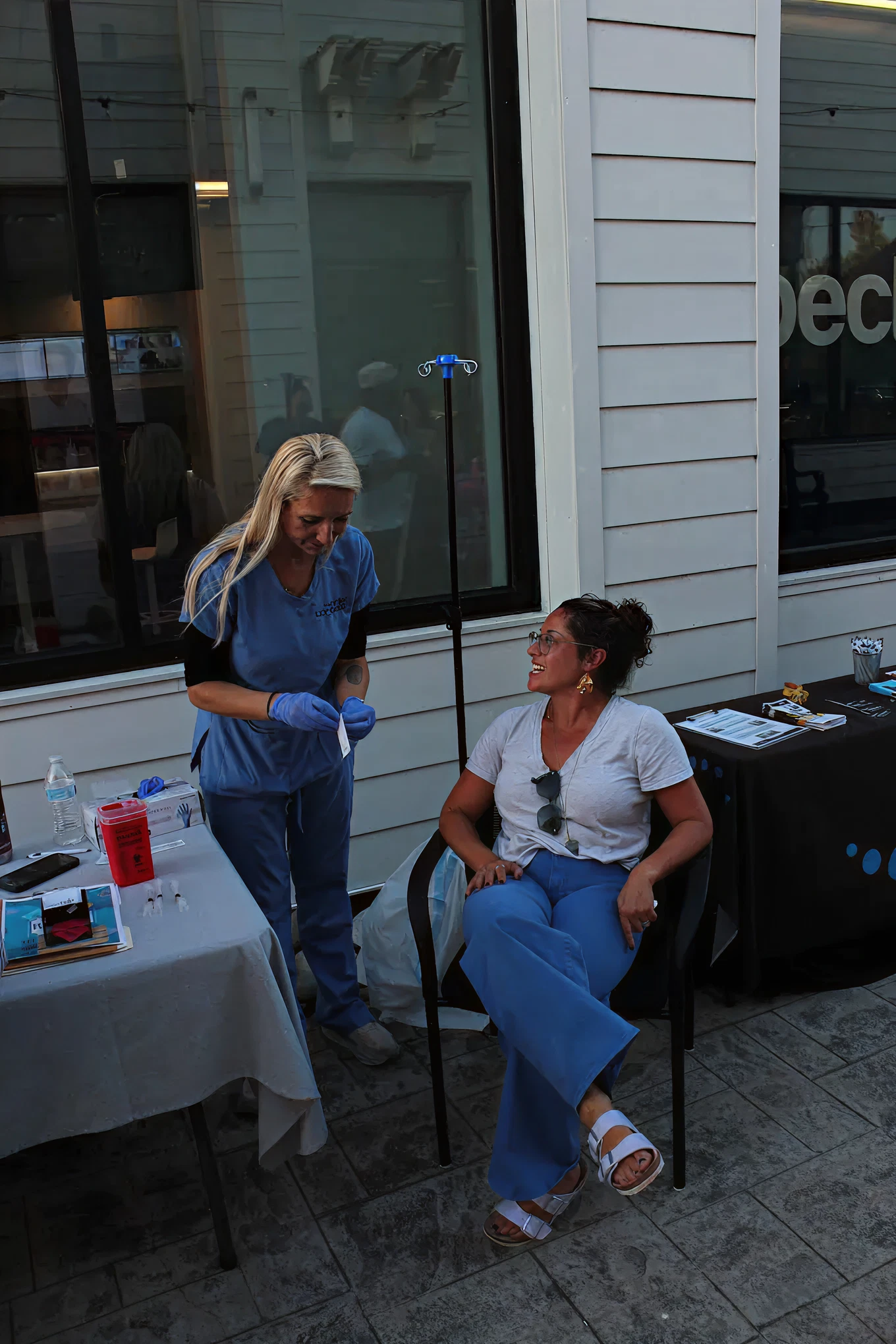 Clinician speaking with a patient during a wellness visit